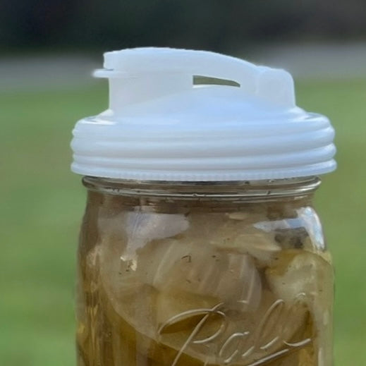Close up of Natural Mason Jar POUR Lid