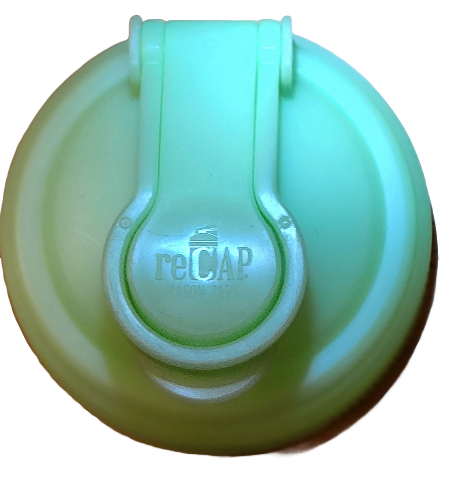 Close up of glow in the dark POUR lid.