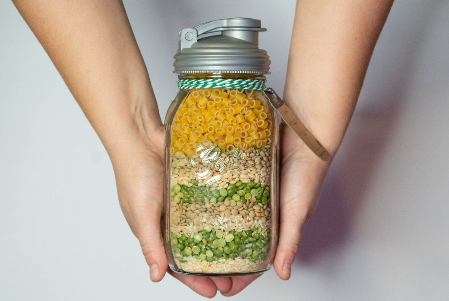 Mason Jar Pour Lid on a jar full of soup mix