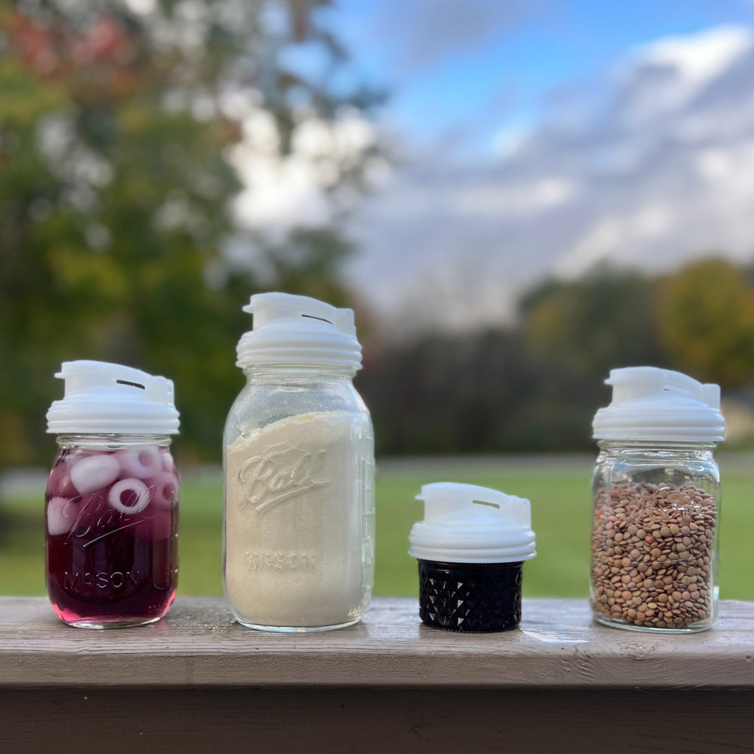 Four White Mason Jar POUR lids.