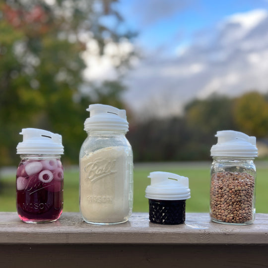 Four White Mason Jar POUR lids.