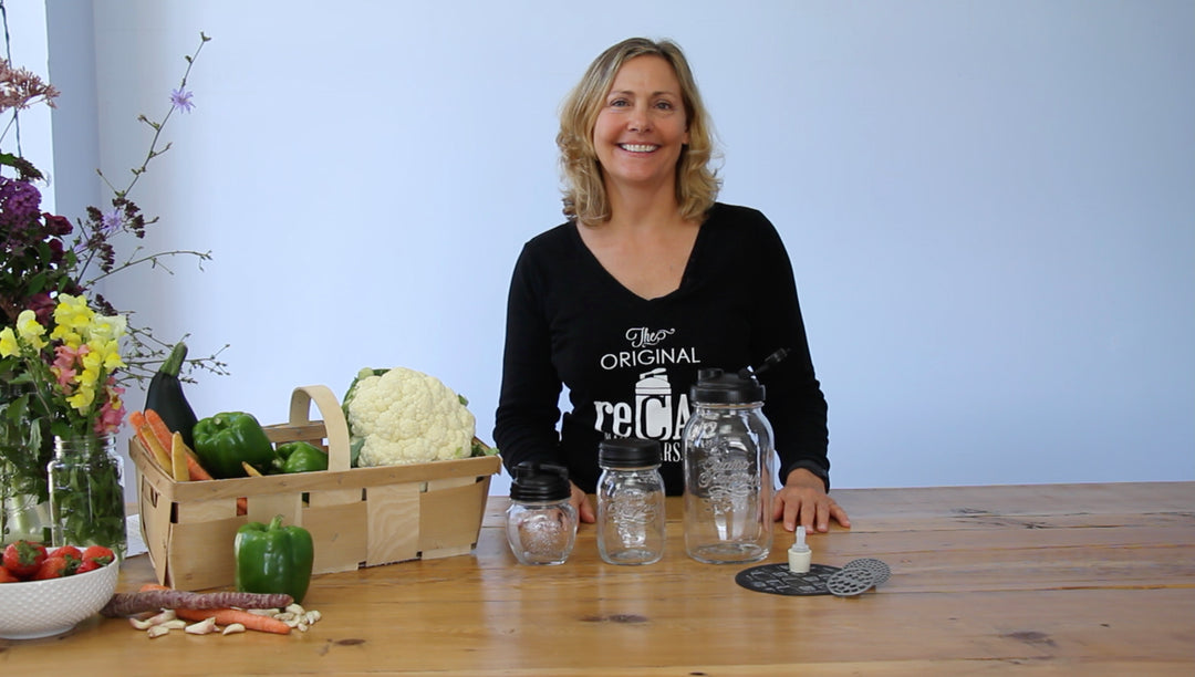 reCAP founder Karen using a Mason jar with a reCAP lid in her kitchen