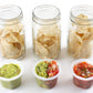 A picture of three wide mouth mason jars full of chips and Cuppow lids full of dip.