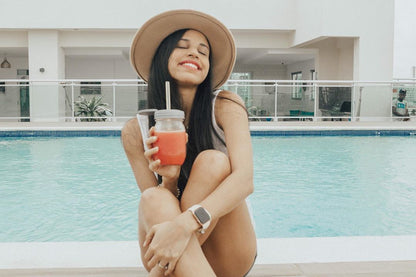 Girl drinking from Mason Jar with FLIP Top Lid