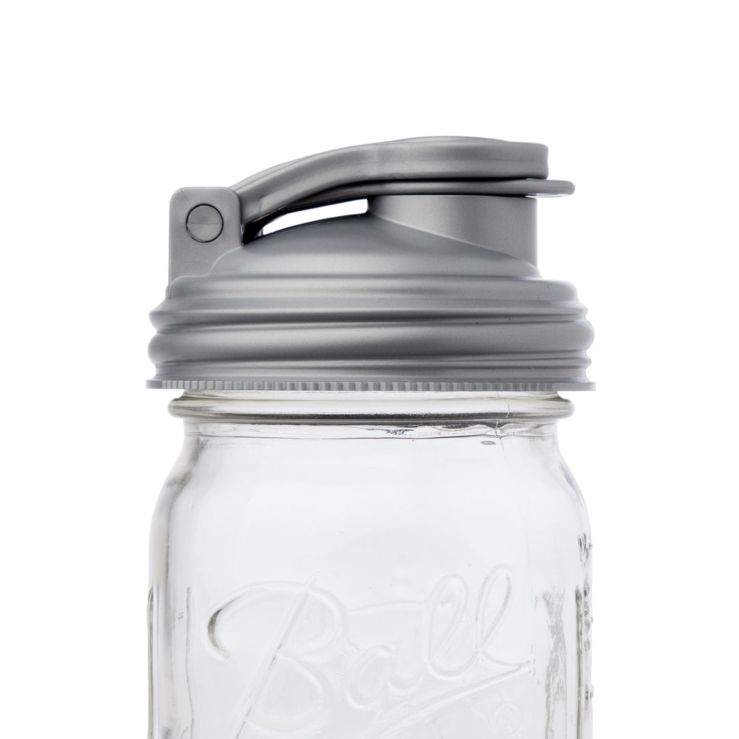 A close up shot of the silver Mason jar POUR lid.
